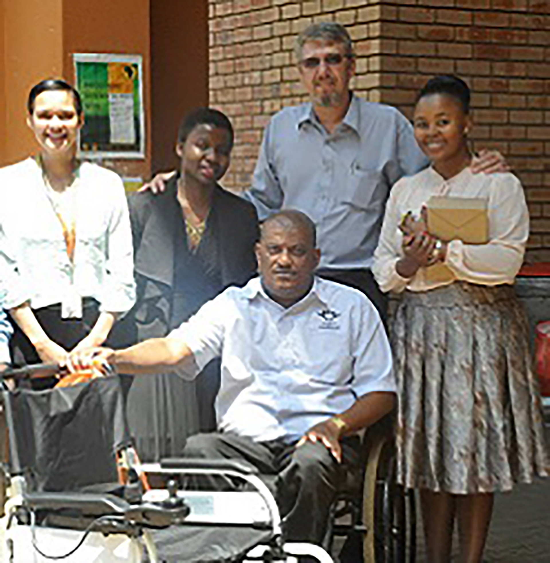 UJ graduate surprise with electric wheelchair