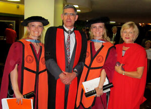 Graham twins graduate with PhD’s in Political Studies