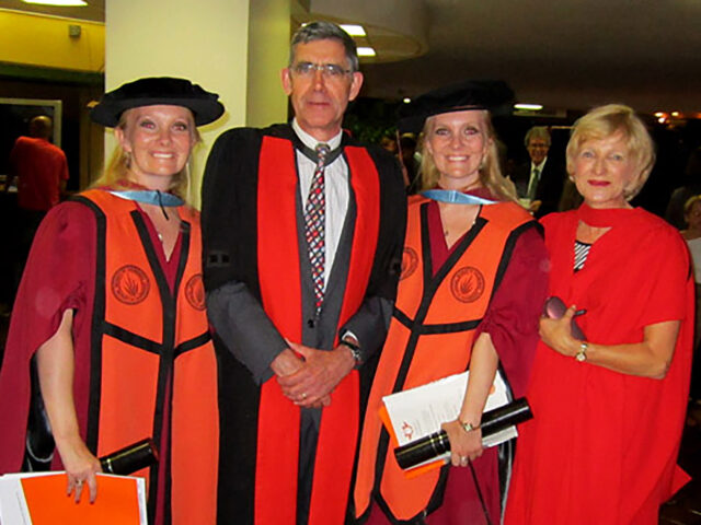 Graham twins graduate with PhD’s in Political Studies