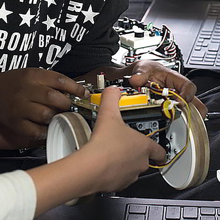 Learners race their DIY robots at UJ AfrikaBOT challenge
