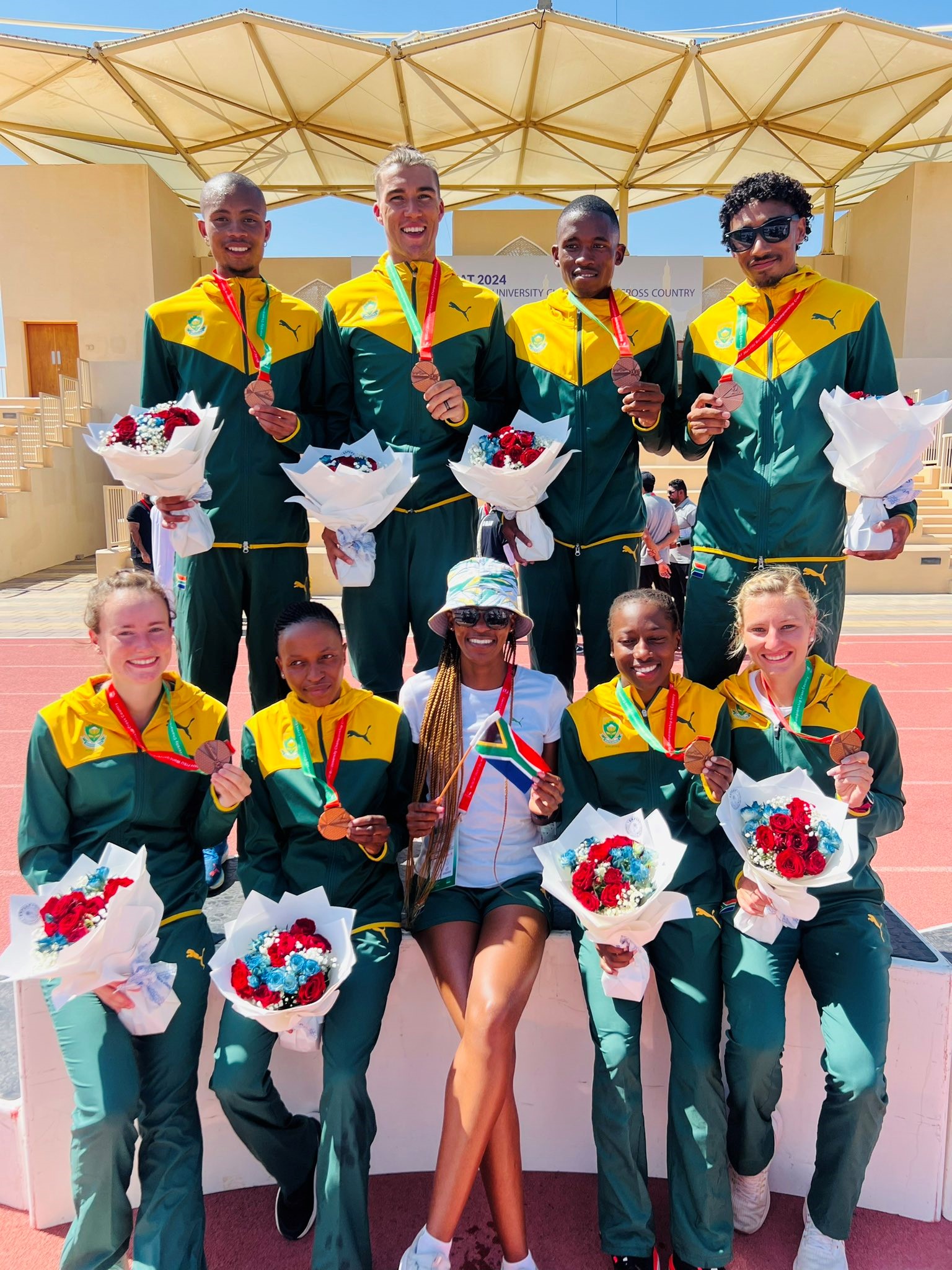 Phemelo Ntoe (top left) and Sisanda Dumisa (bottom second from left) won bronze medals in FISU World University Championship Cross-Country in Muscat Oman.