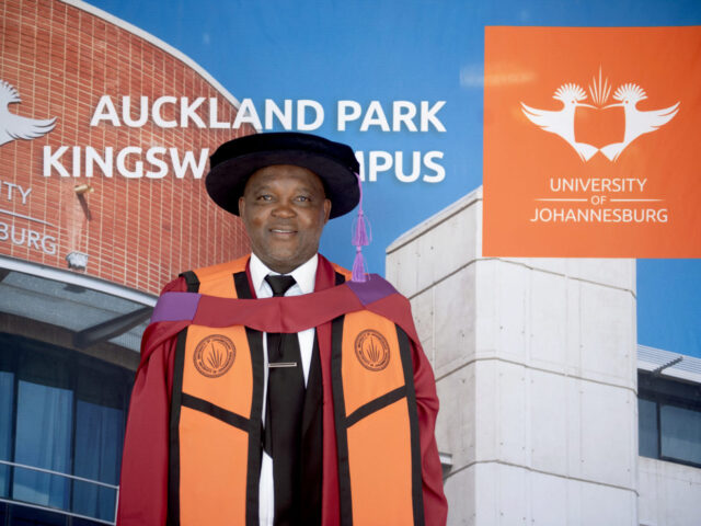 Honorary Doctorate recipient and SA Football Coach, Pitso Mosimane, joins UJ graduates on stage