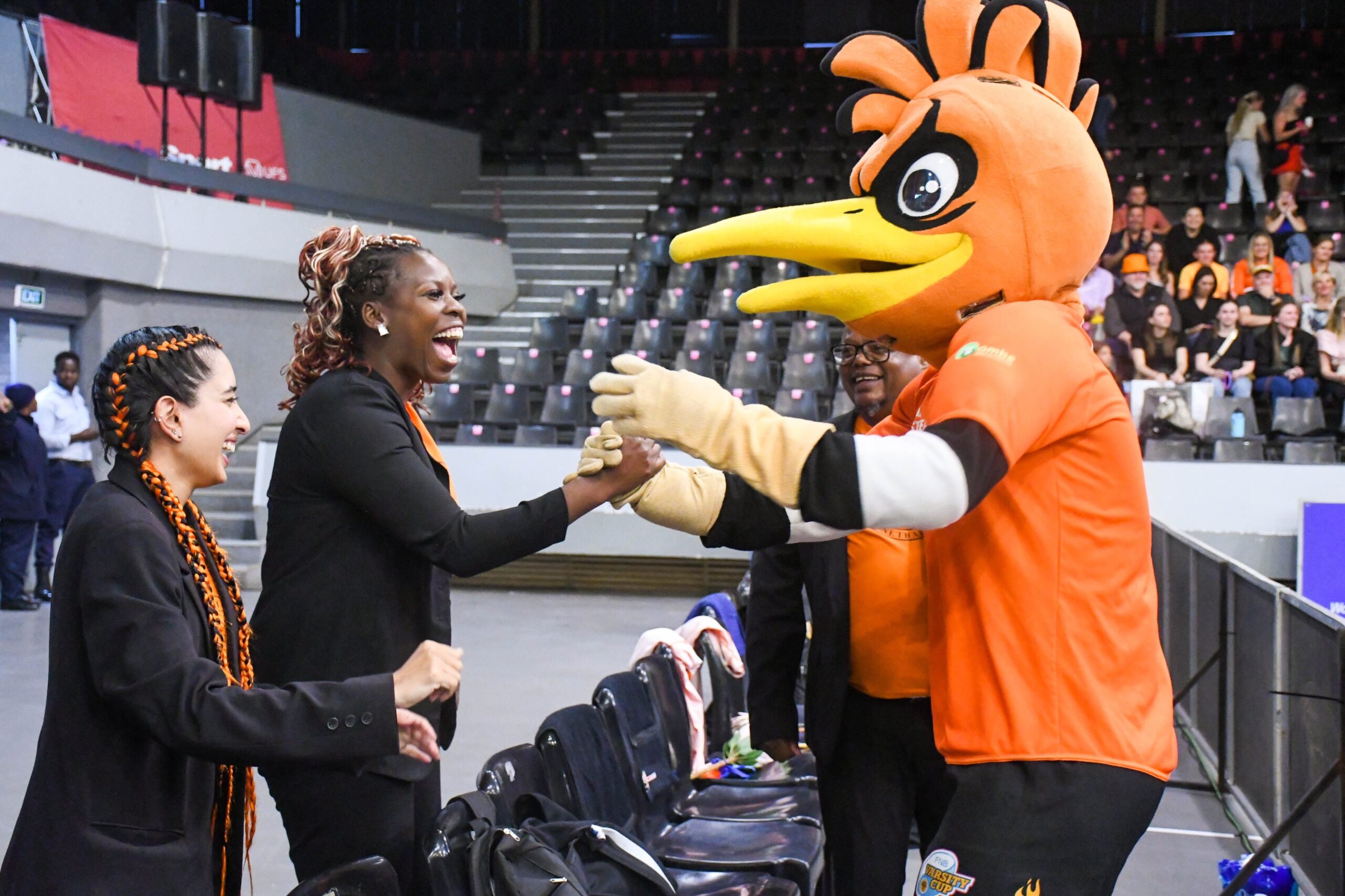 UJ Netball technical team with Hoepie, the UJ Sport mascot in Bloemfontein