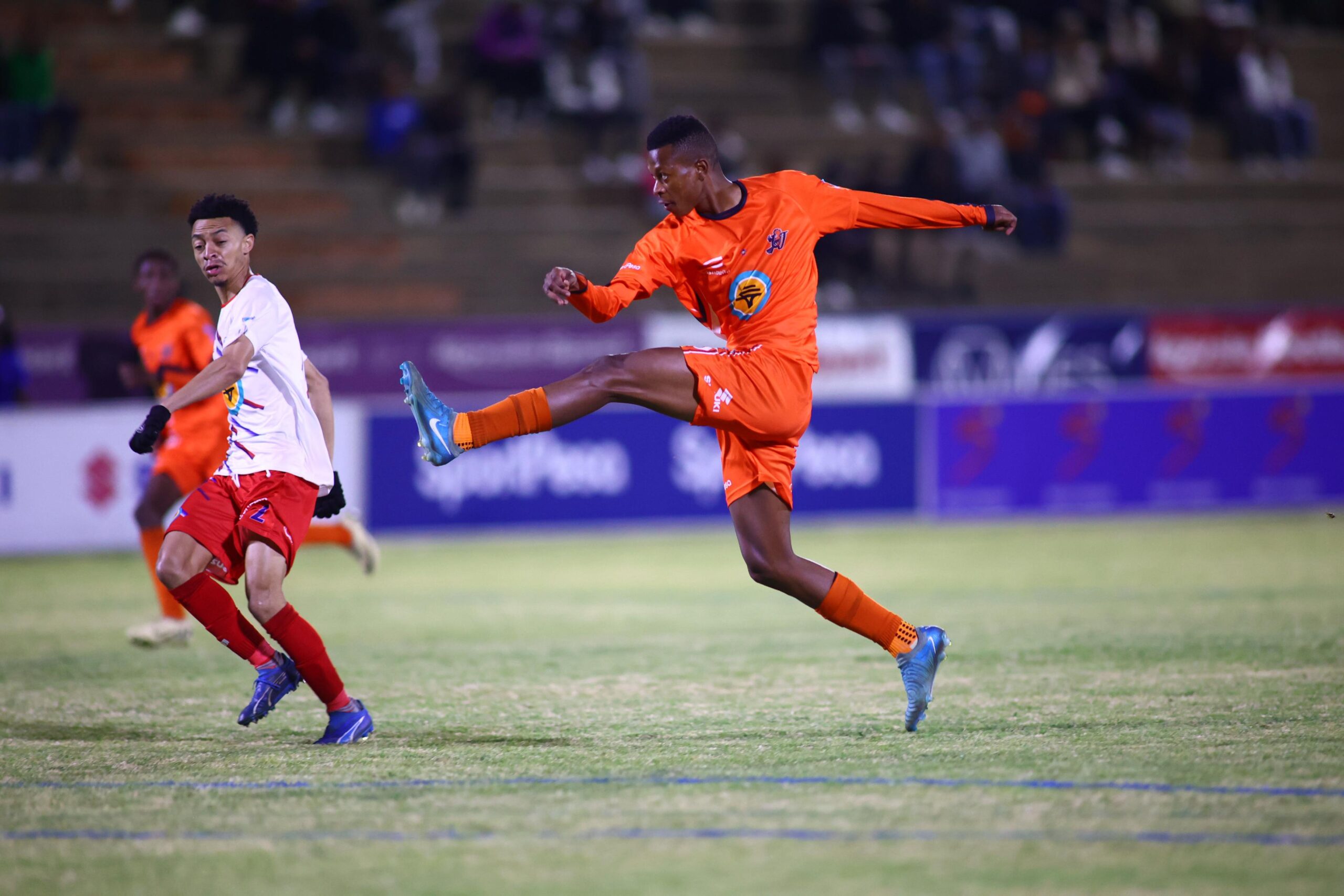 UJs Thabo Moshikere shoots clears the ball from his own half PhotoVarsity Sports - University of Johannesburg News