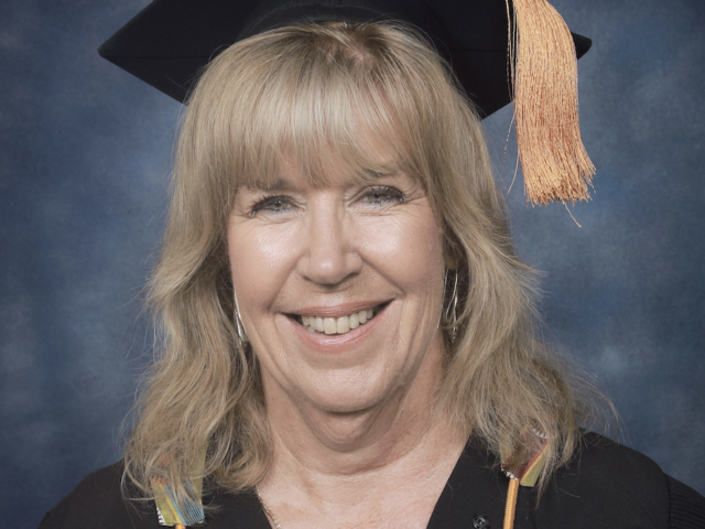 UJ Lecturer Dr Lynne Hazell honoured by students while graduating with distinction